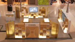 The pop-up space also features USB charging ports and gold-colored couches, where guests can relax before, after, or between flights.