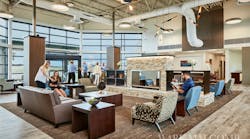 The new terminal design&rsquo;s warm and inviting style represents the Midwestern locale and the interior architecture complements the streamlined design of the surrounding planes with clean lines and geometries.