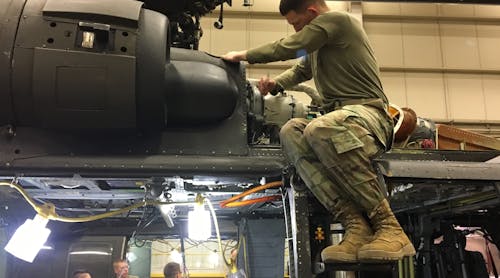 Soldiers with B Company, 2-210th Aviation Regiment, 128th Aviation Brigade, U.S. Army Aviation Center of Excellence, learn to repair a UH-60 helicopter as part of Military Occupation Specialty 15T training at 128th Aviation Brigade at Joint Base Langley-Eustis, Virginia.