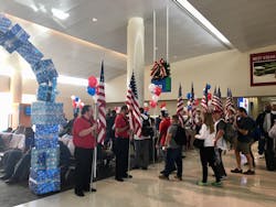 The brave men and women and their families boarded a flight to Dallas courtesy of American Airlines as part of the 13th Annual Seats for Soldiers event. The brave men and women and their families boarded a flight to Dallas courtesy of American Airlines as part of the 13th Annual Seats for Soldiers event.