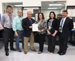 From left, Stanley Routh, FAA Aviation Safety Inspector - Airworthiness; Rob Miller, East/West Industries (EWI) Sr. Quality Engineer; Joseph Spinosa, EWI VP Business Development; Teresa Ferraro, EWI President; Liz Maida, EWI Process Improvements Manager; and Conrad J. DePinto, FAA ASI/PMI - Airworthiness. From left, Stanley Routh, FAA Aviation Safety Inspector - Airworthiness; Rob Miller, East/West Industries (EWI) Sr. Quality Engineer; Joseph Spinosa, EWI VP Business Development; Teresa Ferraro, EWI President; Liz Maida, EWI Process Improvements Manager; and Conrad J. DePinto, FAA ASI/PMI - Airworthiness.