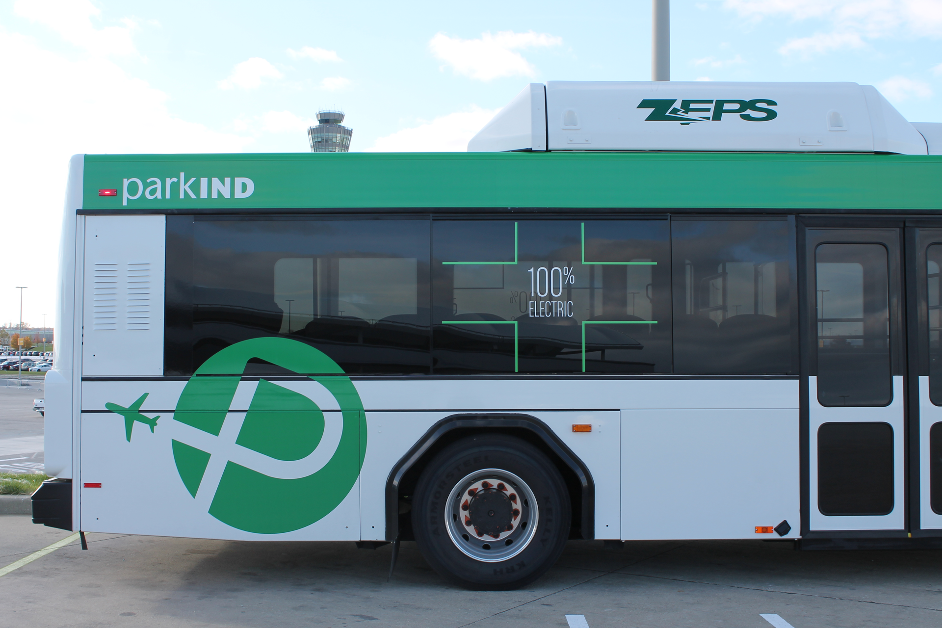 The electric buses at Indianapolis International Airport have a special wrap touting their alternative fuel engines.
