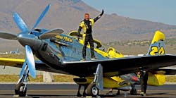 Thom Richard saluting the crowd after a practice run at the 2014 Reno Air Races.