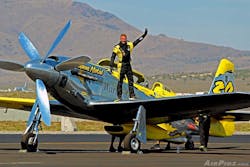 Thom Richard saluting the crowd after a practice run at the 2014 Reno Air Races. Thom Richard saluting the crowd after a practice run at the 2014 Reno Air Races.