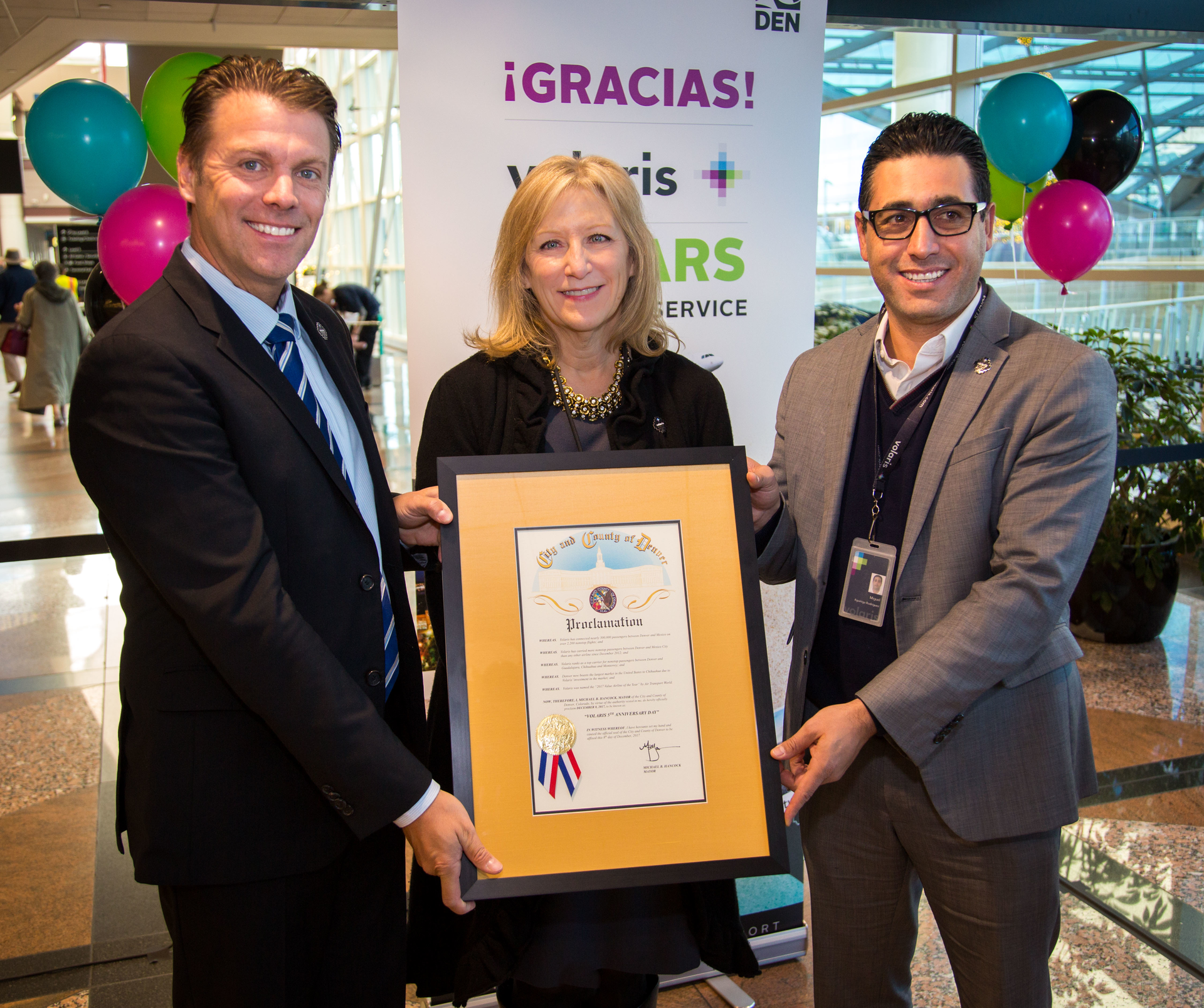 From left to right, Holger Blankenstein, Volaris&rsquo; Chief Commercial Officer; Kim Day, DEN&rsquo;s CEO; Miguel Agui&ntilde;iga, Volaris&rsquo; Senior Sales Marketing Manager - Presentation of Proclamation