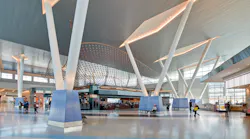 Central concourse 'hub' features soaring 48-foot V columns, which support the wing-inspired roof above.