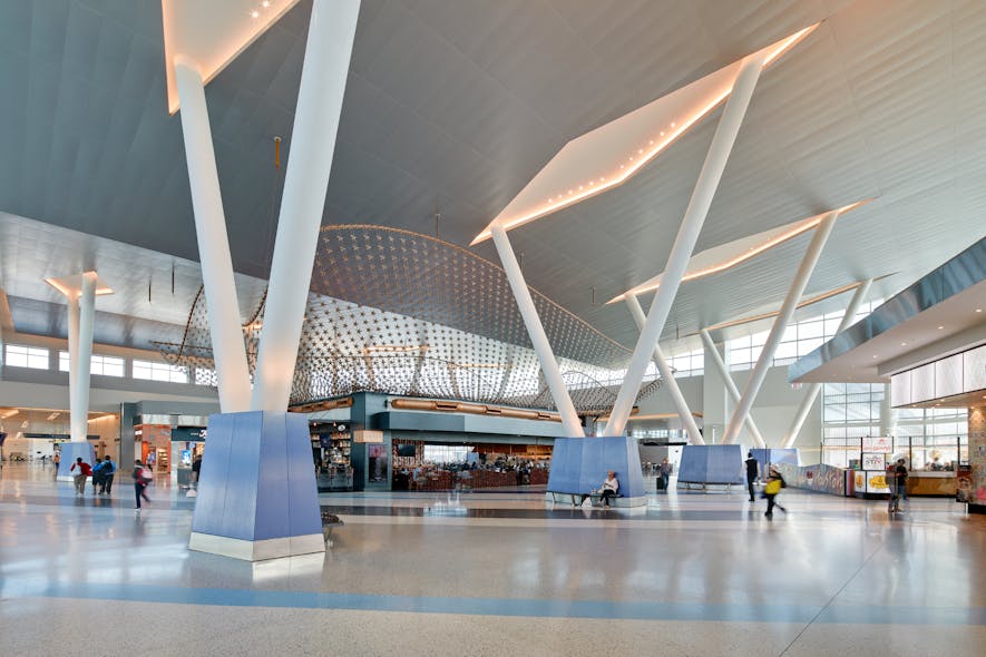 Central concourse &apos;hub&apos; features soaring 48-foot V columns, which support the wing-inspired roof above.