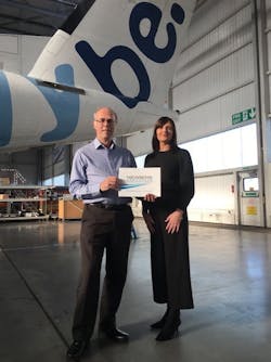 Keith Earnden, Director of Engineering &amp; Maintenance for Flybe and Tiffany Shaw, Key Account Manager for Newbow Aerospace at Flybe Maintenance Facility, Exeter Airport.