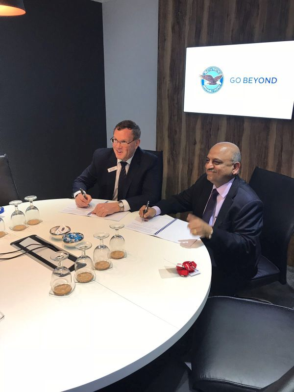 Alliance Air CEO CS Subbiah (right) Signs Services Agreement with P&WC President John Saabas at 2018 Singapore Airshow