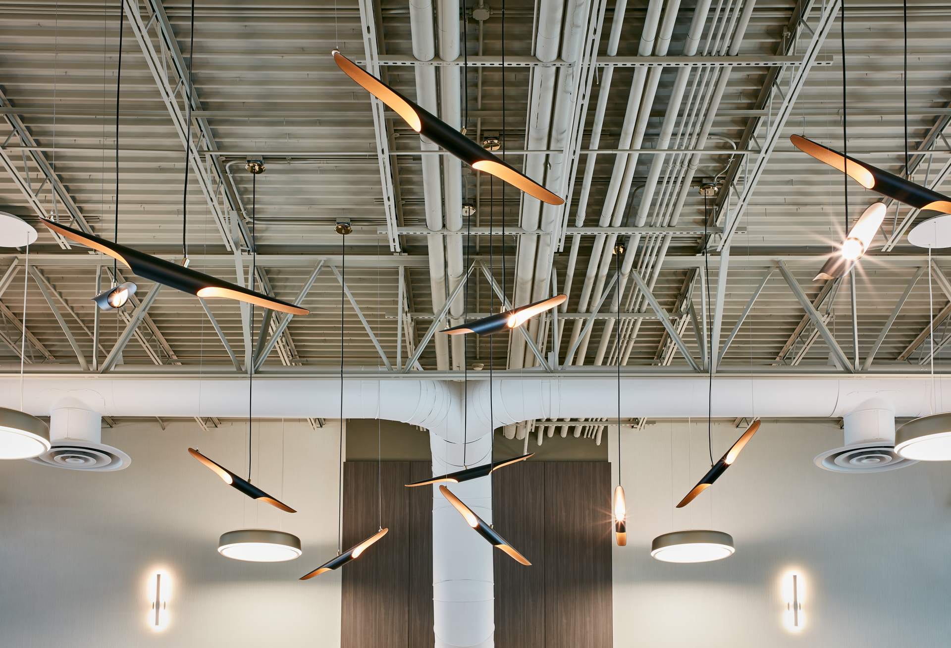 Light fixtures on the ceiling resemble propellers at Atlantic Aviation's terminal in Waukesha, Wis.