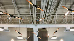 Light fixtures on the ceiling resemble propellers at Atlantic Aviation's terminal in Waukesha, Wis.