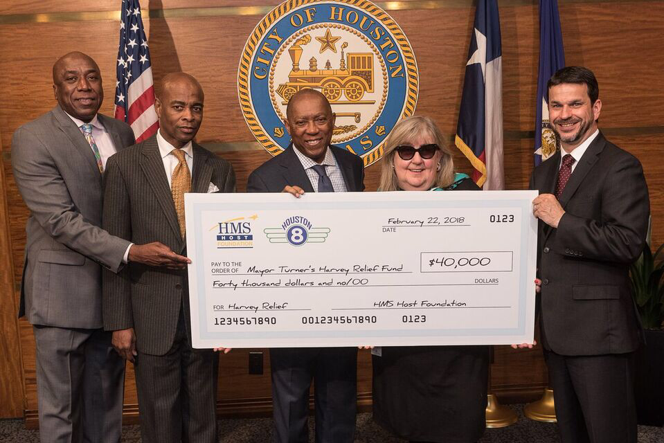 HMSHost and The Houston 8 Team LLC presenting a $40,000 grant to Houston Mayor Sylvester Turner on behalf of HMSHost Foundation. Pictured from left to right: The Houston 8 Team Partner Lynden Rose; The Houston 8 Team Partner Gerald Womack; Houston Mayor Sylvester Turner; The Houston 8 Team LLC Managing Partner Cindy Clifford; and HMSHost Vice President of Business Development Anthony Alessi.