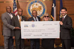 HMSHost and The Houston 8 Team LLC presenting a $40,000 grant to Houston Mayor Sylvester Turner on behalf of HMSHost Foundation. Pictured from left to right: The Houston 8 Team Partner Lynden Rose; The Houston 8 Team Partner Gerald Womack; Houston Mayor Sylvester Turner; The Houston 8 Team LLC Managing Partner Cindy Clifford; and HMSHost Vice President of Business Development Anthony Alessi. HMSHost and The Houston 8 Team LLC presenting a $40,000 grant to Houston Mayor Sylvester Turner on behalf of HMSHost Foundation. Pictured from left to right: The Houston 8 Team Partner Lynden Rose; The Houston 8 Team Partner Gerald Womack; Houston Mayor Sylvester Turner; The Houston 8 Team LLC Managing Partner Cindy Clifford; and HMSHost Vice President of Business Development Anthony Alessi.