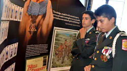 Young JROTC cadets study part of the Hispanic Medal of Honor exhibit that will be on display this year at the 15th annual World War II Heritage Days, April 21-22 at the CAF Dixie Wing Warbird Museum and grounds in Peachtree City, Ga. This year the CAF Dixie Wing is saluting all WWII Medal of Honor recipients.