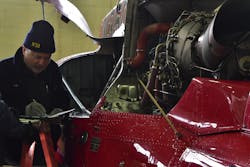 Harald Reichel, an Aerospace Engineer with the NTSB's Office of Aviation Safety, examines the engine of a Liberty Helicopters' helicopter that crashed in the East River here Sunday, March 11, 2018. The NTSB's Go Team has formed an operations group, airworthiness group, powerplants group and a survival factors group to conduct the NTSB's investigation of the crash. Reichel is the chair of the powerplants group. A weather group and air traffic control group were also formed using NTSB investigators in Washington. Harald Reichel, an Aerospace Engineer with the NTSB's Office of Aviation Safety, examines the engine of a Liberty Helicopters' helicopter that crashed in the East River here Sunday, March 11, 2018. The NTSB's Go Team has formed an operations group, airworthiness group, powerplants group and a survival factors group to conduct the NTSB's investigation of the crash. Reichel is the chair of the powerplants group. A weather group and air traffic control group were also formed using NTSB investigators in Washington.