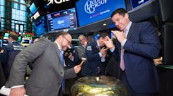 Joseph DiDomizio rings the opening bell at the New York Stock Exchange when the Hudson Group put out its initial public offering.