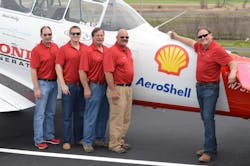 Members of the Shell Aviation Lubricants Team and AeroShell Aerobatic Team celebrate the signing of the new agreement in Tallulah, LA. From left to right: Jon Stoy, General Aviation Manager; and Rodney Eckert, Marketing Manager, from Shell Aviation Lubricants; with Mark Henley, Team Lead; Jimmy Fordham, Slot; and Steve Gustafson, Left Wing, from the AeroShell Aerobatic Team. Members of the Shell Aviation Lubricants Team and AeroShell Aerobatic Team celebrate the signing of the new agreement in Tallulah, LA. From left to right: Jon Stoy, General Aviation Manager; and Rodney Eckert, Marketing Manager, from Shell Aviation Lubricants; with Mark Henley, Team Lead; Jimmy Fordham, Slot; and Steve Gustafson, Left Wing, from the AeroShell Aerobatic Team.