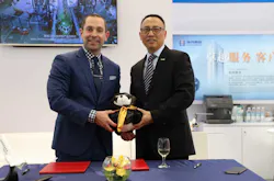 Paul Desgrosseilliers, General Manager of ExecuJet Haite, signed the agreement with Wang Wei, the Executive Vice President of BAA.