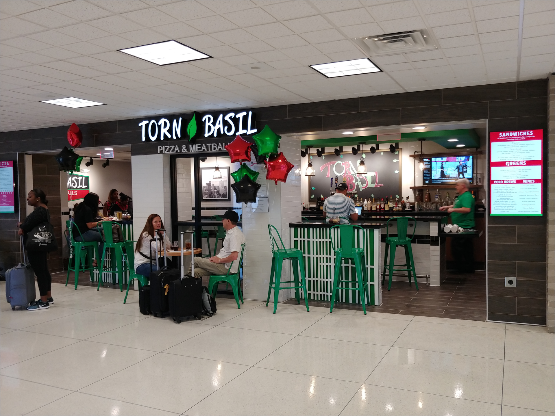 Torn Basil offers pizza, meatballs, salads and sandwiches, as well as a breakfast menu.