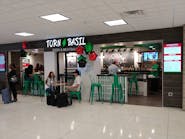 Torn Basil offers pizza, meatballs, salads and sandwiches, as well as a breakfast menu.