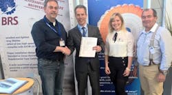 (L-R) Technical Officer of DAeC Michael Baetz presents ultralight Type Certificate to BRS Aerospace CEO Fernando de Caralt and BRS Aerospace German representatives Stefanie and Frank Miklis.