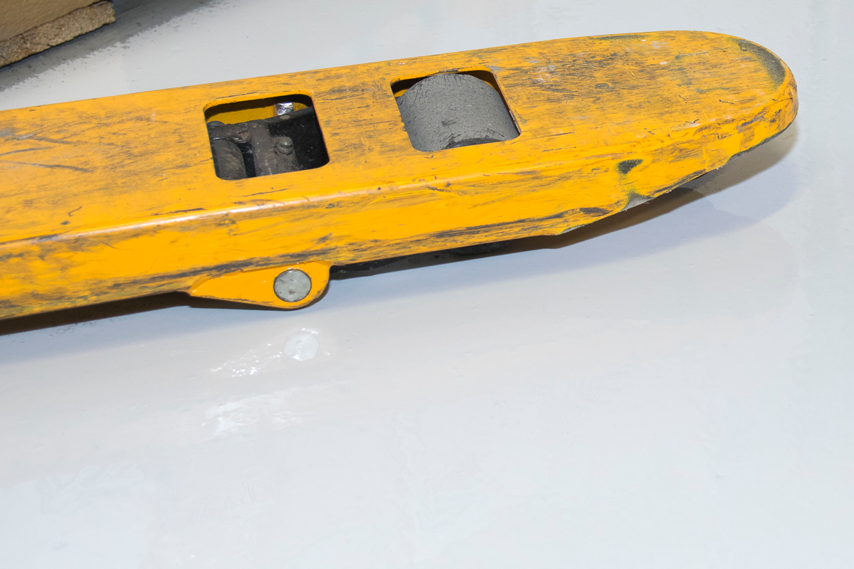 WearCOAT 2330 (shown with yellow lift truck) is a two-component product that offers a gloss finish.