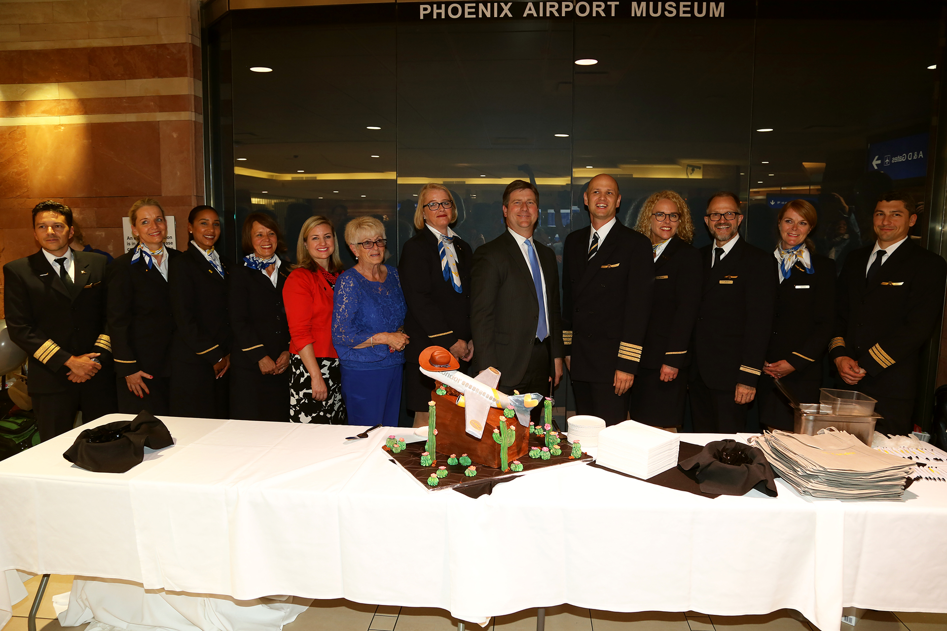 From left to right, Condor Crew members pose with Phoenix Councilwoman Kate Gallego, Phoenix Vice Mayor Thelda Williams, Phoenix Mayor Greg Stanton, and Condor Captain Dirk Seitz.