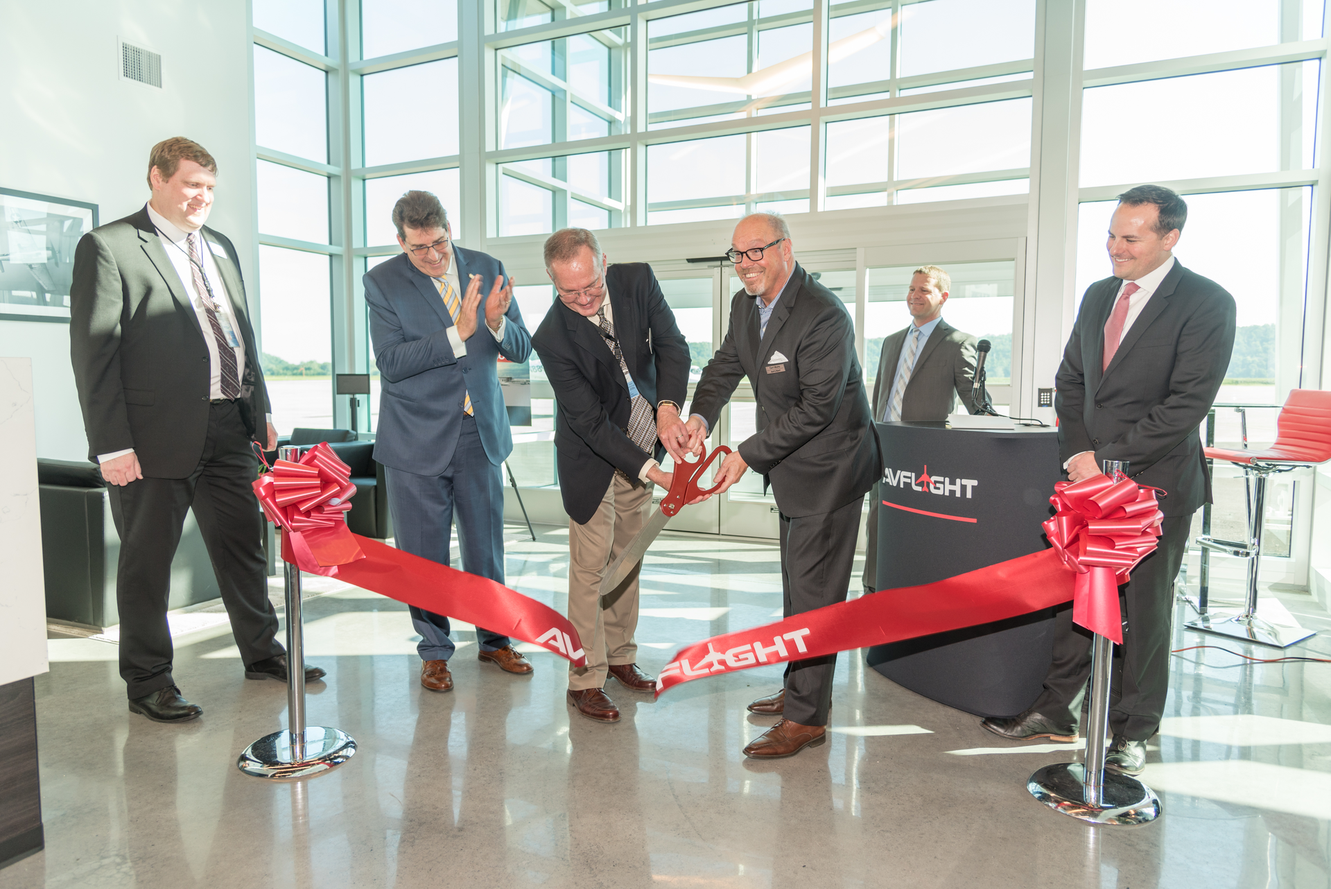 Marshall Stevens, deputy executive director of Harrisburg International Airport; State Sen. John DiSanto, Pennsylvania; Tim Edwards, director of aviation for Harrisburg International Airport; Carl Muhs, president of Avflight; Garret Hain, director of finance for Avflight; Joe Meszaros, director of operations for Avflight.