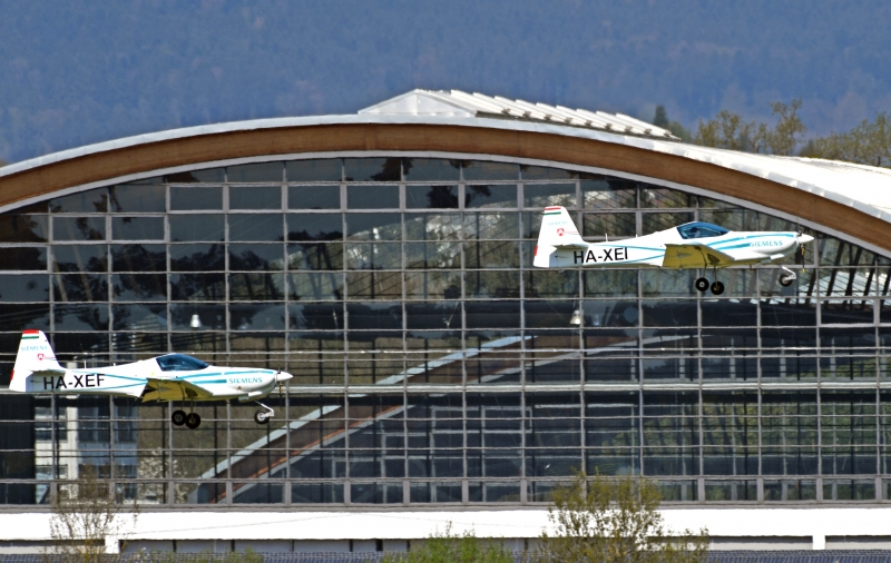 Magnus Aircraft eFusion in flight in front of the halls of Messe . The new propeller aircraft from Hungary is powered by a Siemens eAircraft electric motor and also powered by batteries of the German electric company.