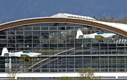 Magnus Aircraft eFusion in flight in front of the halls of Messe . The new propeller aircraft from Hungary is powered by a Siemens eAircraft electric motor and also powered by batteries of the German electric company. Magnus Aircraft eFusion in flight in front of the halls of Messe . The new propeller aircraft from Hungary is powered by a Siemens eAircraft electric motor and also powered by batteries of the German electric company.