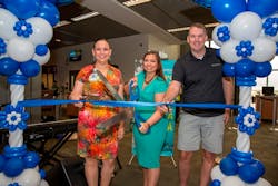 Cutting the ribbon to celebrate new Austin-Punta Cana nonstop on Vacation Express are from left: Susana Carbajal, Assistant Director, Austin-Bergstrom International Airport; Pamela Caltabiano, Vacation Express, PR and Social Media Manager; and Chad Shields, Owner, Engage Vacations.