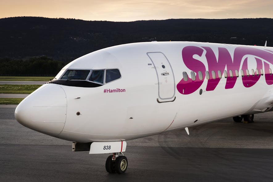 Swoop&apos;s first aircraft is named #Hamilton after their first base. (CNW Group/Swoop)