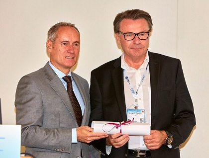 Right to Left, Siegfried Axtmann, FAI Founder and Group Chairman proudly accepts his Diamond Award, presented by EBAA&rsquo;s Chairman, Mr. Juergen Wiese.