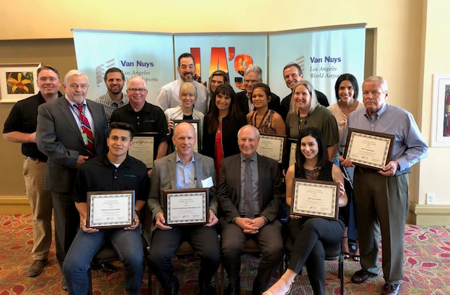 Los Angeles Board of Airport Commissioners member, Jeffery Daar, second from right, and recipients of the Friendly Flyer noise abatement awards given for flying friendly in 2017.