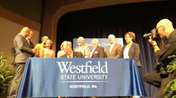 Governor Baker signs the DCAMM Bond Bill, which provides capital funding for the major projects, critical repairs, and deferred maintenance awards made through the Higher Education Capital Planning process, at Parenzo Hall, Westfield State University