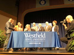 Governor Baker signs the DCAMM Bond Bill, which provides capital funding for the major projects, critical repairs, and deferred maintenance awards made through the Higher Education Capital Planning process, at Parenzo Hall, Westfield State University