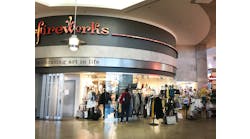 Travelers shopping in upgraded retail space