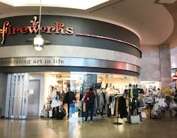 Travelers shopping in upgraded retail space