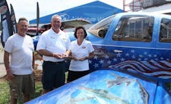 Jarrell has awarded special Liberty challenge coins to two Hartzell Propeller&apos;s Air Force veterans, Gary Chafin, Vice President, Global Sales &amp; Product Support and Kristin Bendickson, Account Manager OEM Sales. Jarrell is CEO of RMJ Electrical Contractors in Phoenix.