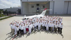 Honda Aircraft Company associates celebrate the delivery of the first HondaJet Elite.
