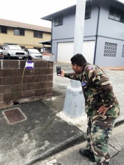 Second Lt. Kamalama Kaikuana, the Hawaii Wing&rsquo;s assistant director of communications, tries out the FEMA app he downloaded to his phone on the island of Oahu.