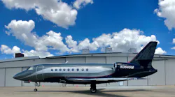 Falcon Dumont In front of airport bdg 5b86ff345761c