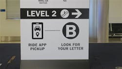 An example of the new Ride App Pickup icon in Terminal 2's baggage claim area, with instructions on how to find the nearest ride app pickup area. An example of the new Ride App Pickup icon in Terminal 2's baggage claim area, with instructions on how to find the nearest ride app pickup area.