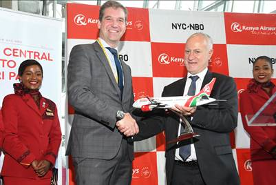 Roel Huinink, President and CEO of JFKIAT and Michael Joseph, Kenya Airways Chairman celebrate Kenya Airways' inaugural flight with a celebratory ribbon cutting on October 29.