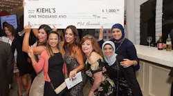 From left to right, Asimena Patsaros, Lisa Mease Ho, Lauren Rago, Leslie Hatton, Fatima Boulhaj and Keltoum Guihia celebrating with the Merchant of the Year check.