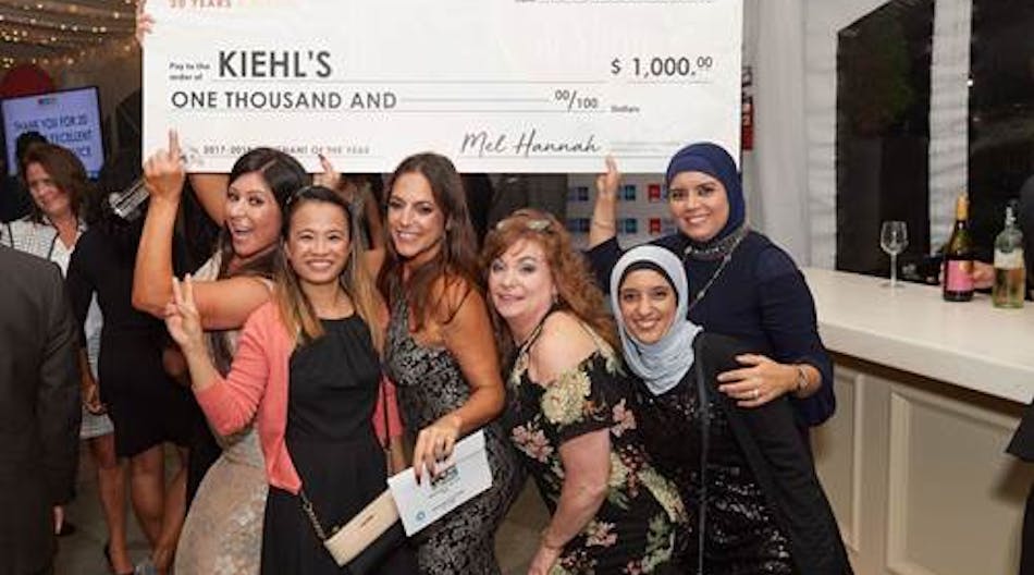 From left to right, Asimena Patsaros, Lisa Mease Ho, Lauren Rago, Leslie Hatton, Fatima Boulhaj and Keltoum Guihia celebrating with the Merchant of the Year check.