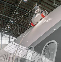 An Invert Robotics remote controlled climbing robot inspecting an aircraft.