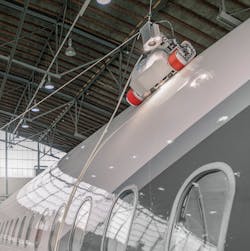 An Invert Robotics remote controlled climbing robot inspecting an aircraft. An Invert Robotics remote controlled climbing robot inspecting an aircraft.