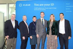 Left to right: Frank DiMola, Executive Director, Terminal Four Airline Consortium (TFAC); John Bambury, Federal Security Director of JFK Airport, TSA; Stephanie Baldwin, Vice President of JFK Airport Operations, Delta Air Lines; Roel Huinink, President and CEO, JFKIAT; Caryn Seidman-Becker, Chairman and CEO, Clear; Ken Cornick, President, Clear. Left to right: Frank DiMola, Executive Director, Terminal Four Airline Consortium (TFAC); John Bambury, Federal Security Director of JFK Airport, TSA; Stephanie Baldwin, Vice President of JFK Airport Operations, Delta Air Lines; Roel Huinink, President and CEO, JFKIAT; Caryn Seidman-Becker, Chairman and CEO, Clear; Ken Cornick, President, Clear.
