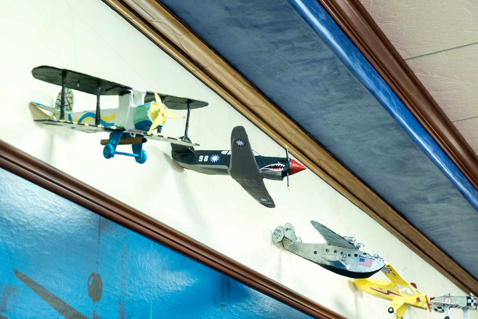 Saint Andrew&rsquo;s School student paper mach&eacute; planes on display at Signature Flight Support in Boca Raton